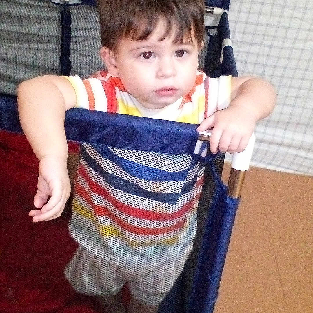 Zay Garcia joined the competition — help win amazing prizes! bed, boy, chair, child, clothing, crib, cushion, dress, face, furniture, head, homedecor, infantbed, male, pants, person, photography, portrait, shorts, t_shirt
