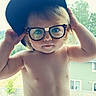 baby, building, cap, child, curious, cute, diaper, expression, face, glasses, hands, nature, outdoor, person, portrait, shirtless, toddler, trees, window, young