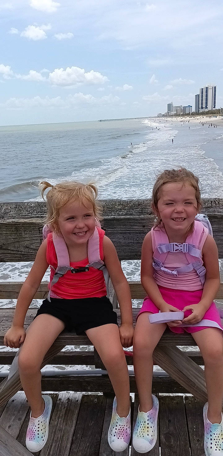 Kylie joined the competition — help win amazing prizes! baby_toddler_clothing, beach, body_of_water, cloud, fun, happy, joy, leisure, people, people_on_beach, person, photograph, pink, shorts, skin, sky, smile, summer, thigh, toddler