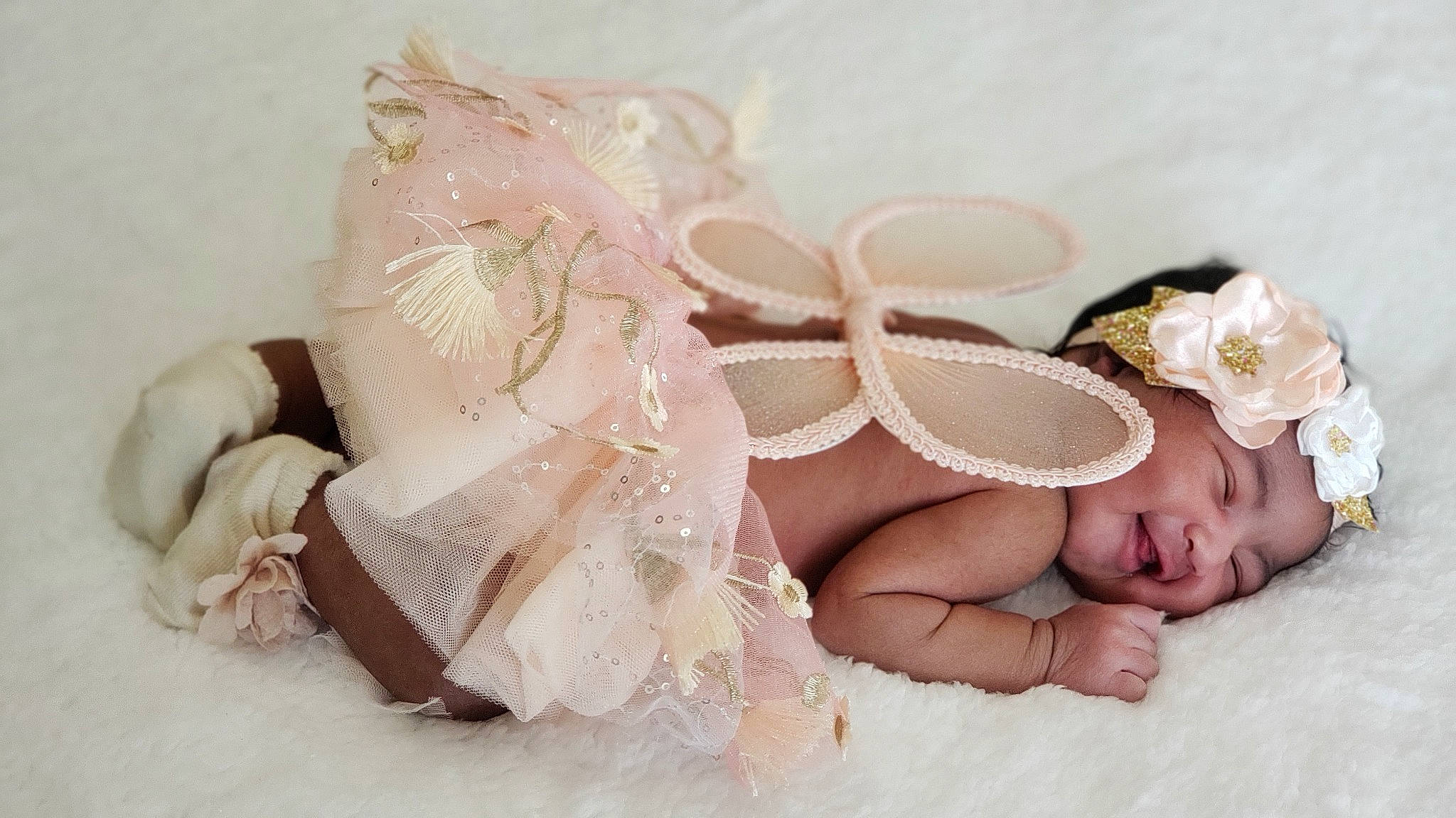 Hawinan is registered to the contest to win money with this photo: baby, baby_toddler_clothing, bridal_accessory, clothing, comfort, dress, embellishment, flash_photography, hair_accessory, hand, happy, head, headband, headgear, headpiece, headwear, human_body, jewellery, leg, person