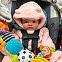 Gianna joined the competition — help win amazing prizes! baby, child, pink_hoodie, car_seat, toy, colorful, caterpillar_toy, plush, cute, infant, straps, blanket, face, eyes, clothing, indoor, soft, comfort, safety, hood