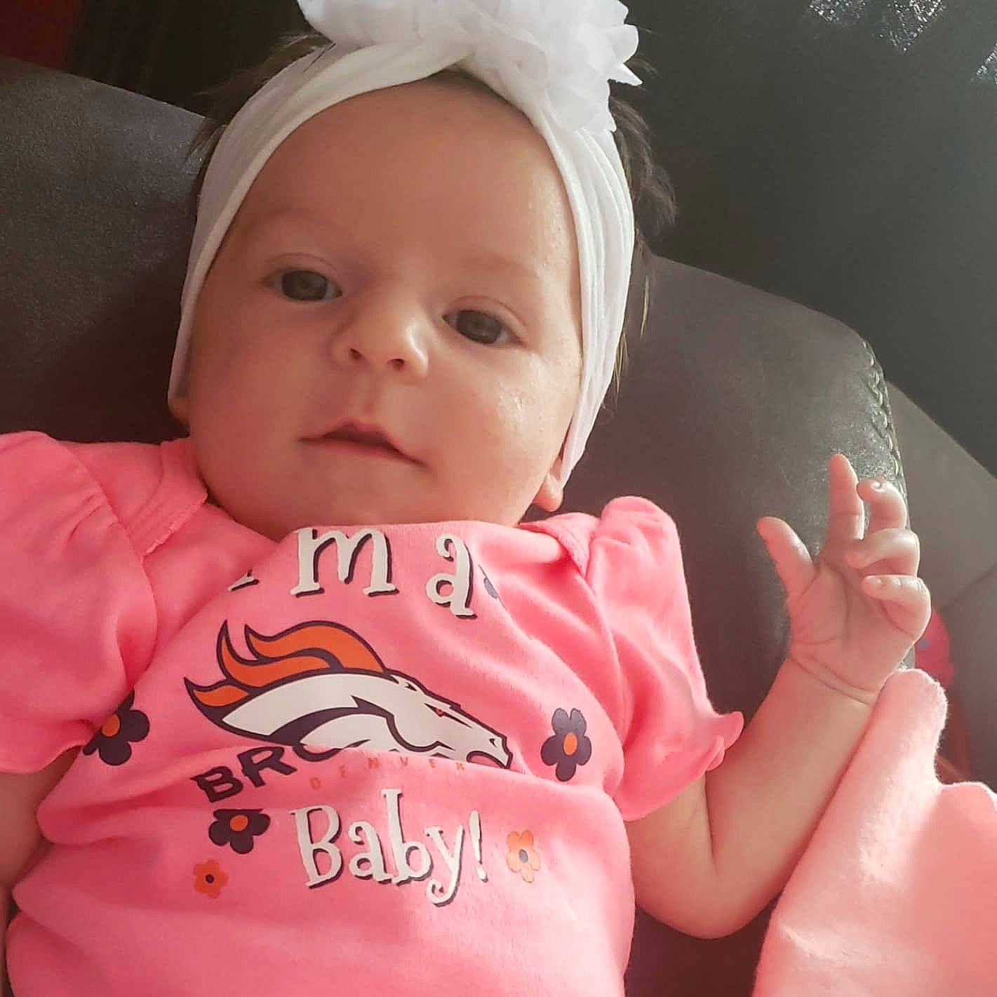 Alani is registered to the contest to win money with this photo: baby, baby_products, baby_toddler_clothing, cheek, child, cool, ear, face, finger, hand, head, headgear, lip, mouth, nose, person, pink, product, skin, thumb