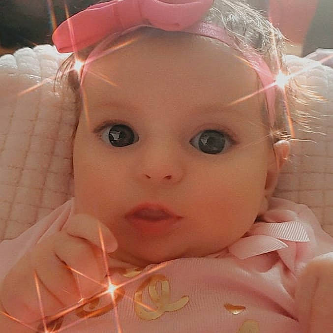 Alani is registered to the contest to win money with this photo: baby, beauty, cheek, child, chin, close_up, ear, eye, eyebrow, eyelash, face, forehead, head, iris, lip, mouth, nose, person, pink, skin