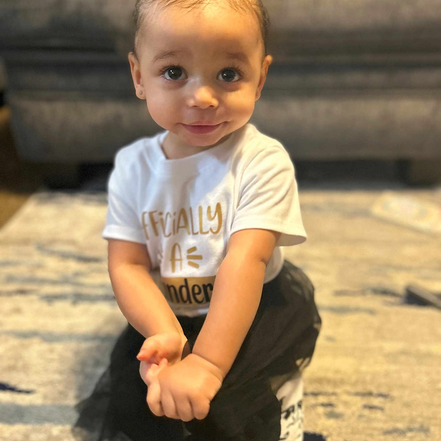 Janessa joined the competition — help win amazing prizes! baby, bodypart, clothing, couch, face, finger, furniture, hair, hand, happy, head, pants, person, photography, portrait, shorts, sitting, sleeve, smile, t_shirt