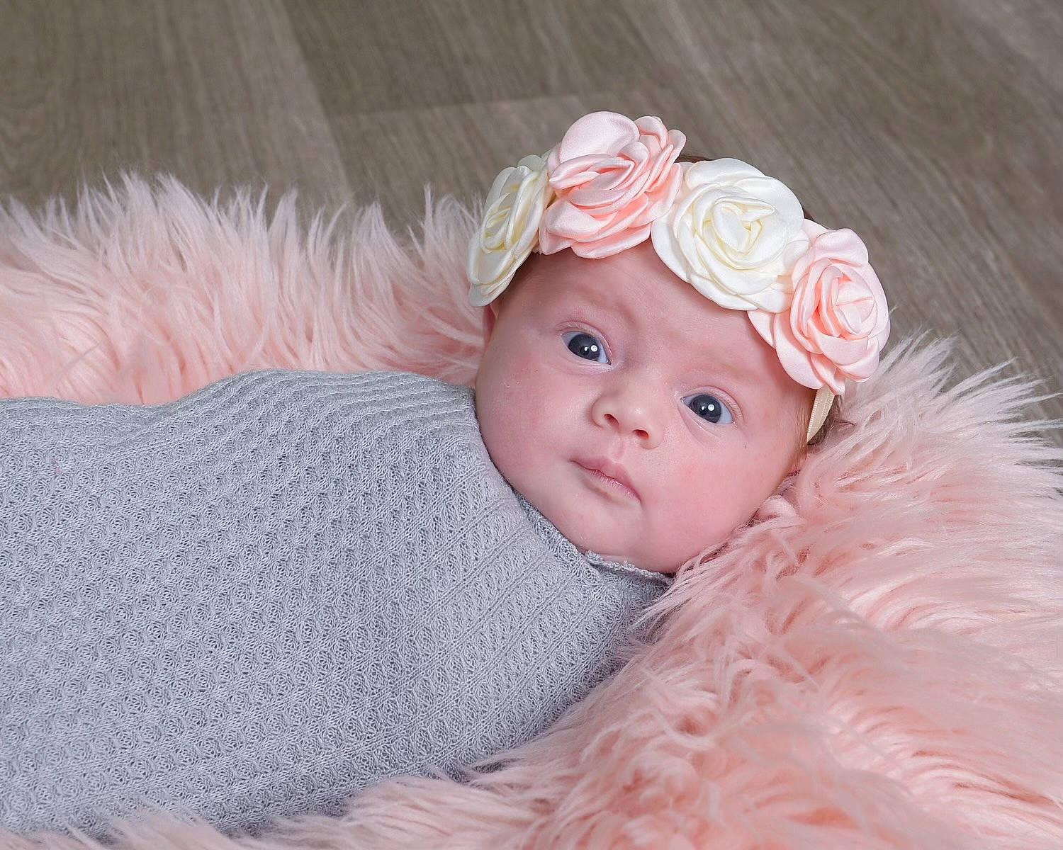 Sophia is registered to the contest to win money with this photo: baby, baby_toddler_clothing, child, costume, costume_accessory, costume_hat, embellishment, fashion_accessory, fur, hair_accessory, hat, headgear, headpiece, headwear, iris, pattern, peach, person, petal, pink