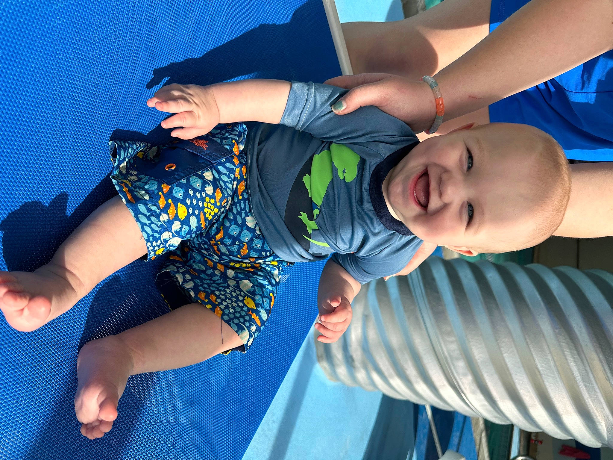 Jackson is registered to the contest to win money with this photo: beauty, blue, elbow, electric_blue, flash_photography, fun, gesture, grass, happy, human_body, human_leg, joint, joy, knee, leisure, people_in_nature, person, shoulder, sleeve, thigh