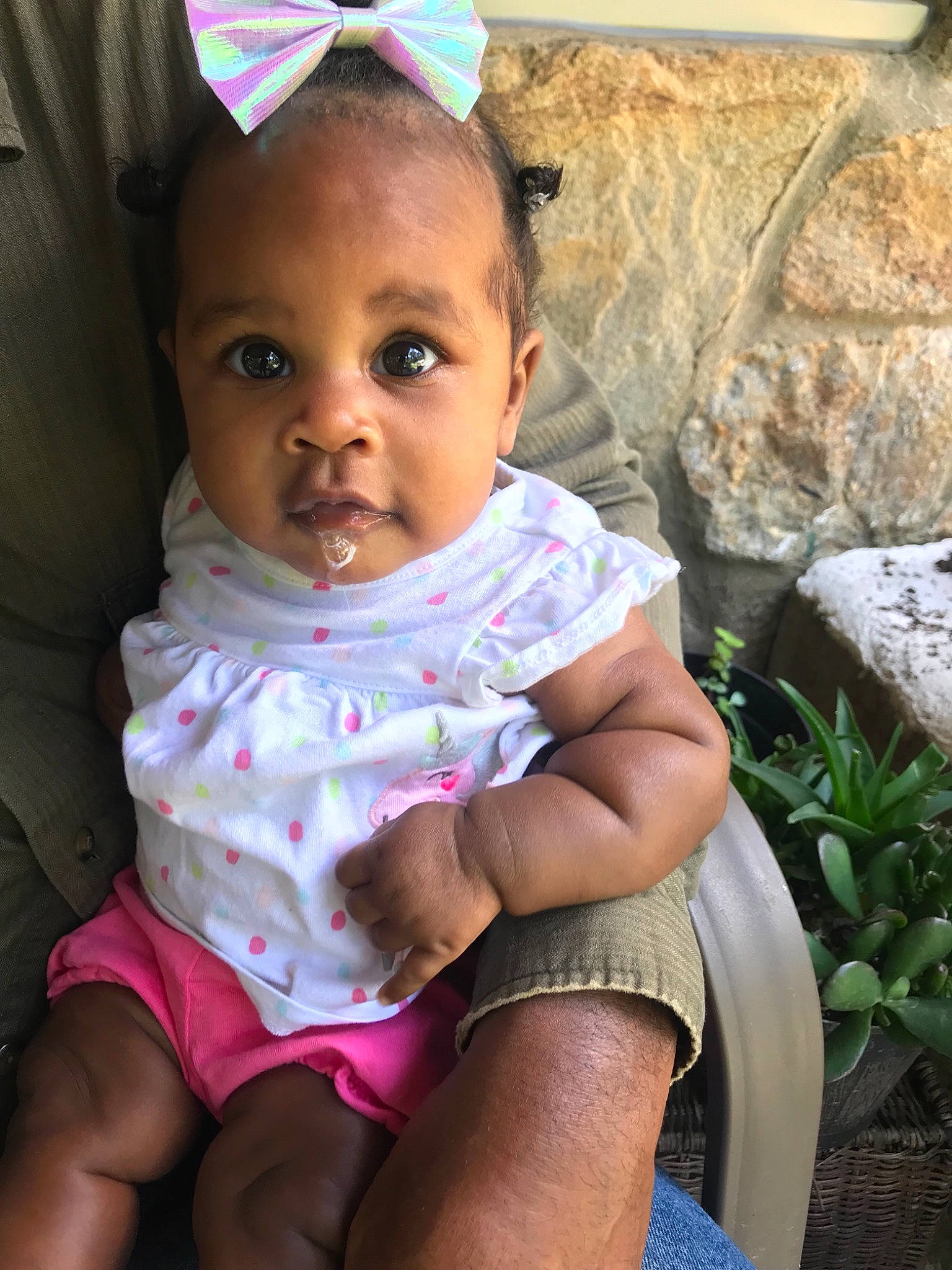 Zola is registered to the contest to win money with this photo: adaptation, baby, baby_toddler_clothing, cheek, child, eye, face, fun, hand, happy, head, human, lip, neck, people, person, pink, sitting, skin, smile