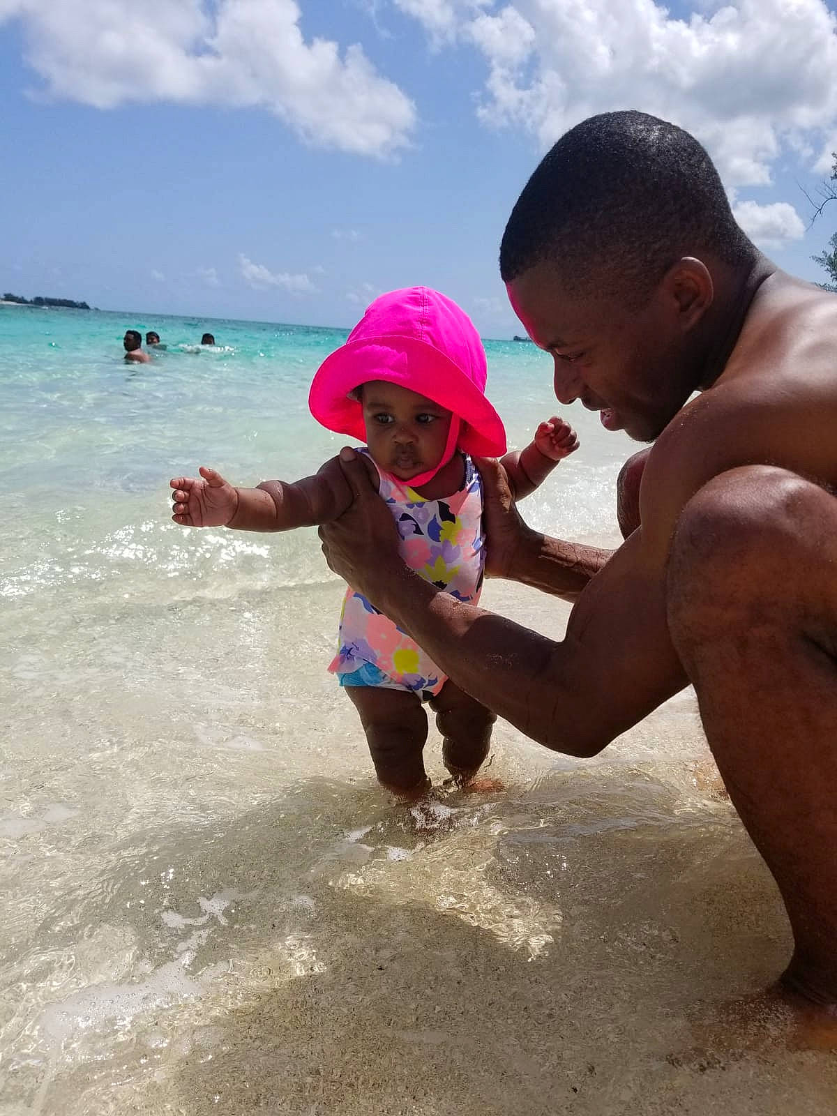 Zola is registered to the contest to win money with this photo: beach, child, coast, fun, happy, headwear, holiday, leisure, ocean, people, people_on_beach, person, play, sand, sea, sky, smile, summer, toddler, tourism