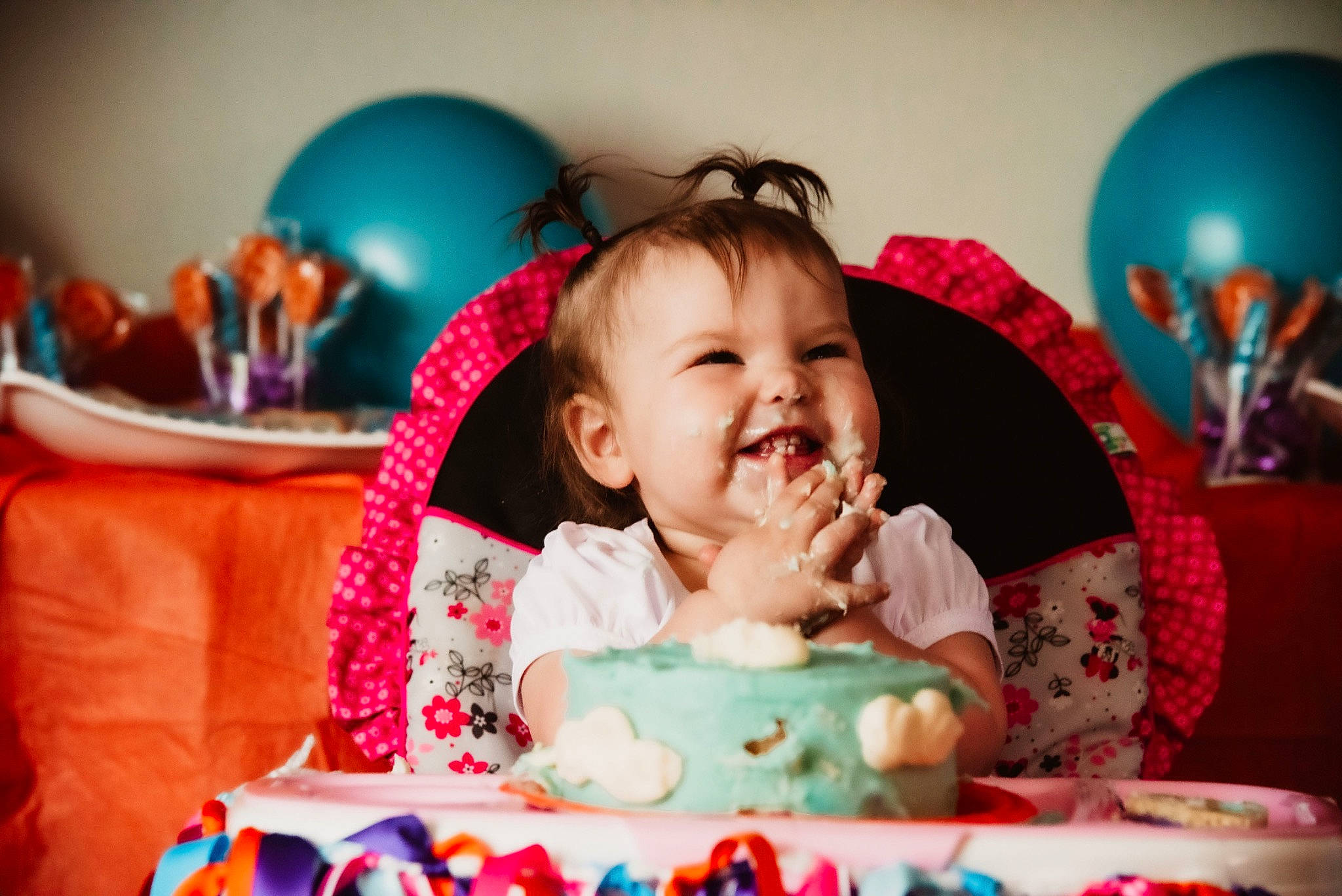 Oaklee joined the competition — help win amazing prizes! baby, balloon, birthday, blue, cake, cake_decorating, cake_decorating_supply, child, event, facial_expression, fun, happy, joy, lighting, person, photograph, pink, purple, smile, snapshot