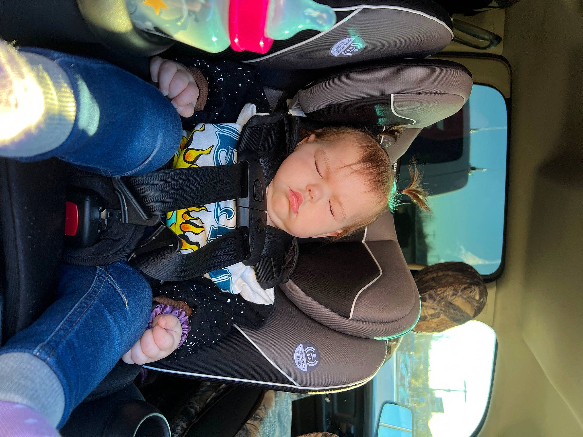 Oaklee is registered to the contest to win money with this photo: auto_part, automotive_design, automotive_exterior, automotive_wheel_system, baby, baby_carriage, baby_products, car_seat, comfort, family_car, fun, helmet, luxury_vehicle, motor_vehicle, person, personal_protective_equipment, recreation, steering_wheel, toddler, vehicle_door