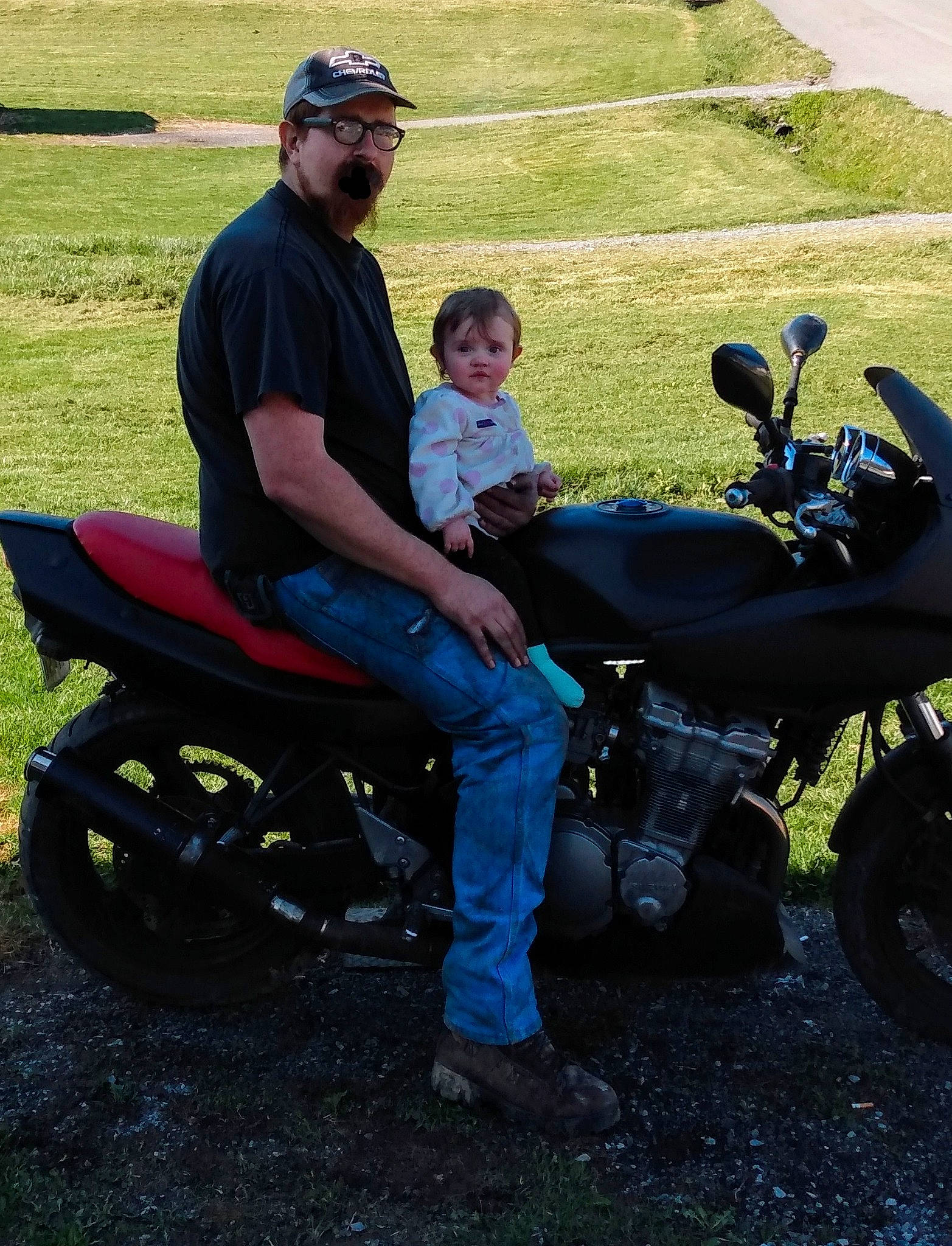 Sabrina is registered to the contest to win money with this photo: auto_part, automotive_design, automotive_lighting, automotive_tire, automotive_wheel_system, fender, fuel_tank, fun, grass, headwear, lap, motor_vehicle, motorcycle, motorcycle_accessories, motorcycling, person, product, recreation, smile, tire