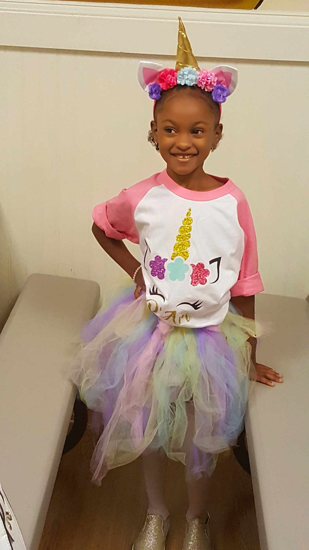 D'Ari is registered to the contest to win money with this photo: ballet_tutu, child, clothing, costume, dance_dress, fun, girl, hair_accessory, joy, person, pink, product, purple, toddler