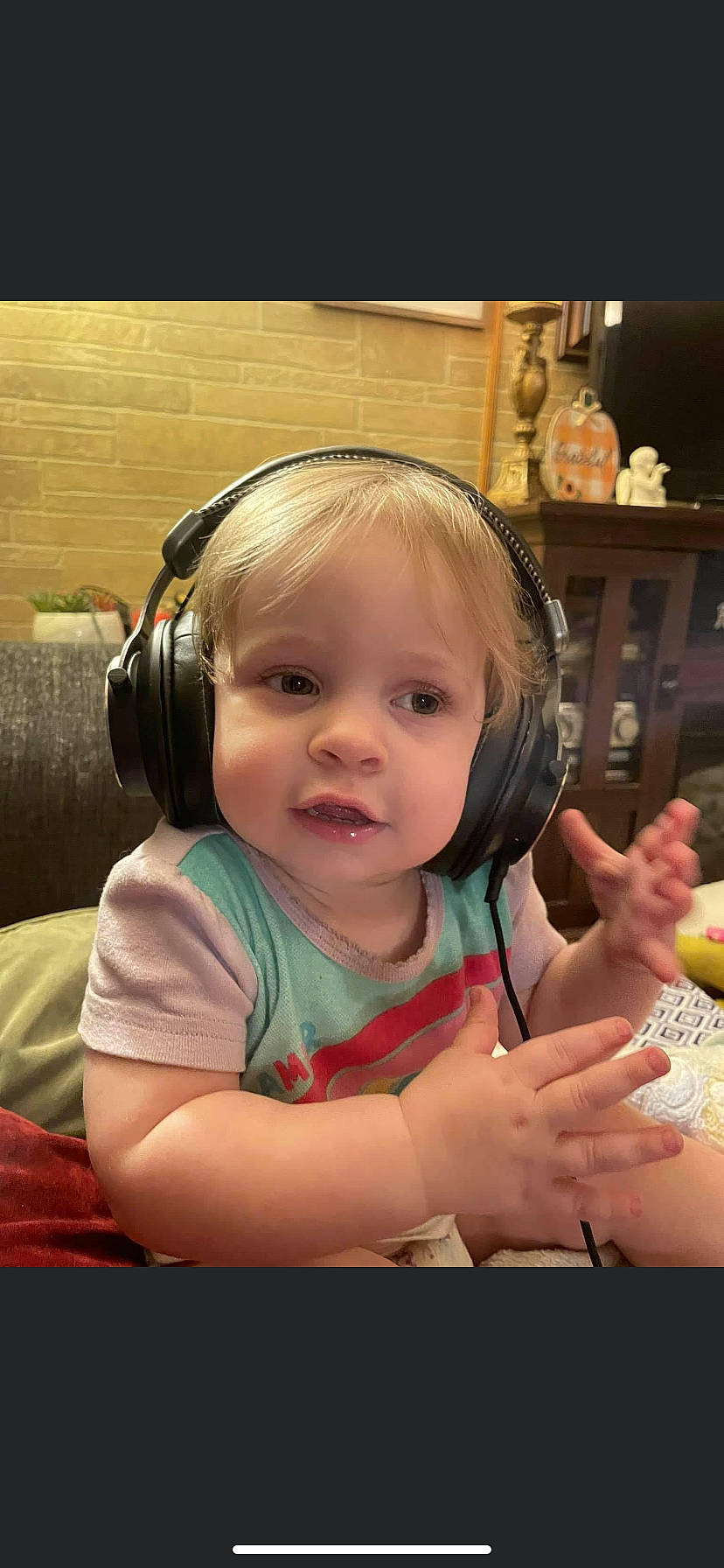Jesslynn joined the competition — help win amazing prizes! arm, audio_equipment, baby, cheek, child, ear, electronic_device, eye, finger, fun, gadget, gesture, hand, happy, headphones, hearing, nose, peripheral, person, smile