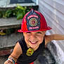 accessories, bodypart, boy, bracelet, cap, child, clothing, face, finger, hand, hardhat, hat, head, helmet, jewelry, male, person, photography, portrait, shorts