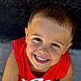 Preston is registered to the contest to win money with this photo: background_blur, boy, casual_clothing, child, close_up, cute, daylight, eyes, face, happy, head_and_shoulders, outdoor, person, portrait, red_shirt, short_hair, skin, smiling, teeth, young