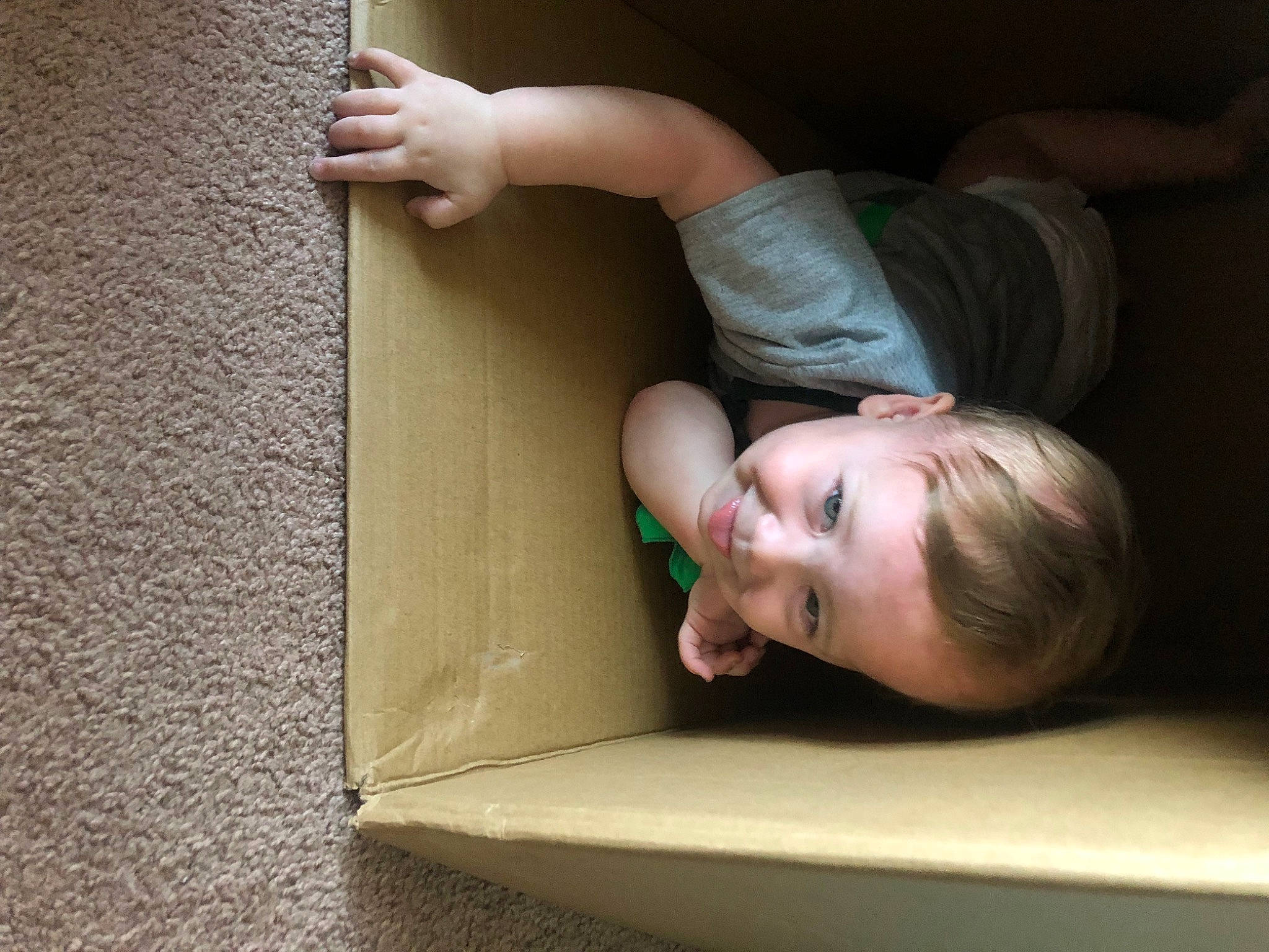 Jay is registered to the contest to win money with this photo: baby, blond, chair, child, comfort, elbow, finger, flash_photography, floor, flooring, fun, gesture, hardwood, human_leg, joint, joy, mouth, neck, person, smile