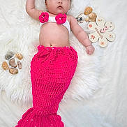 Anaya joined the competition — help win amazing prizes! baby, infant, mermaid_costume, crochet, pink, headband, shells, fluffy_rug, white_background, 3_months_sign, cute, lying_down, portrait, child, adorable, handmade, costume, soft_texture, decor, celebration