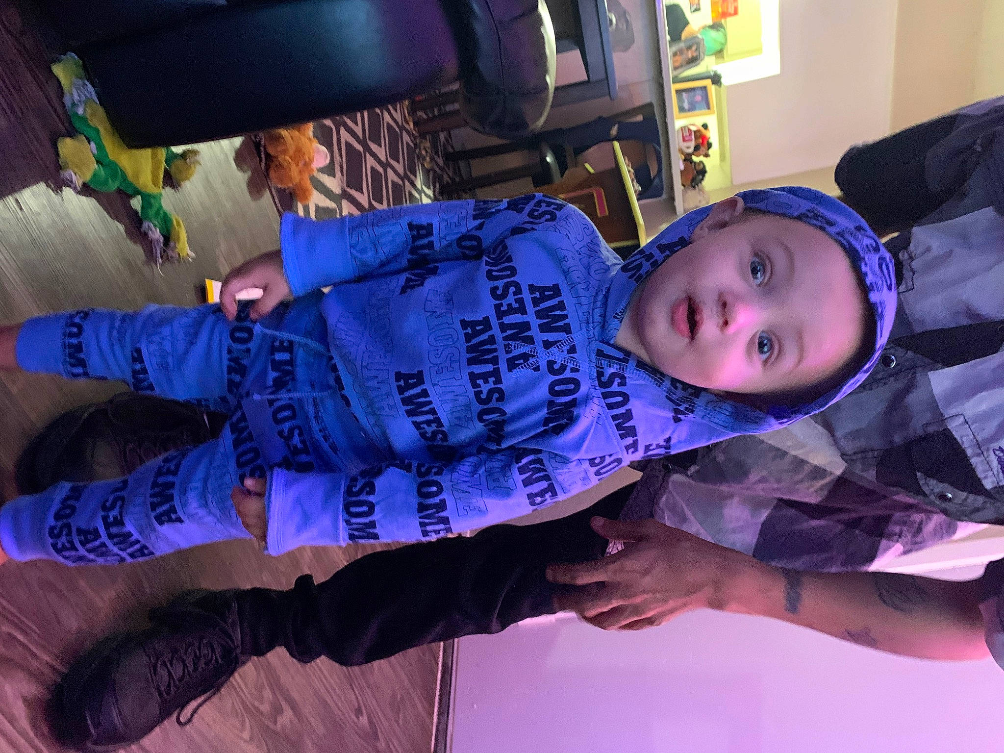 Jared is registered to the contest to win money with this photo: arm, baby_toddler_clothing, child, clothing, electric_blue, fun, headwear, jacket, leisure, person, purple, sleeve, toddler, violet