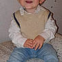 Tyler participe au concours pour gagner de l'argent avec cette photo : toddler, child, smiling, happy, jeans, vest, white_shirt, barefoot, indoor, cushion, patterned, cute, sitting, face, hands, feet, light_skin, short_hair, portrait, casual_clothing
