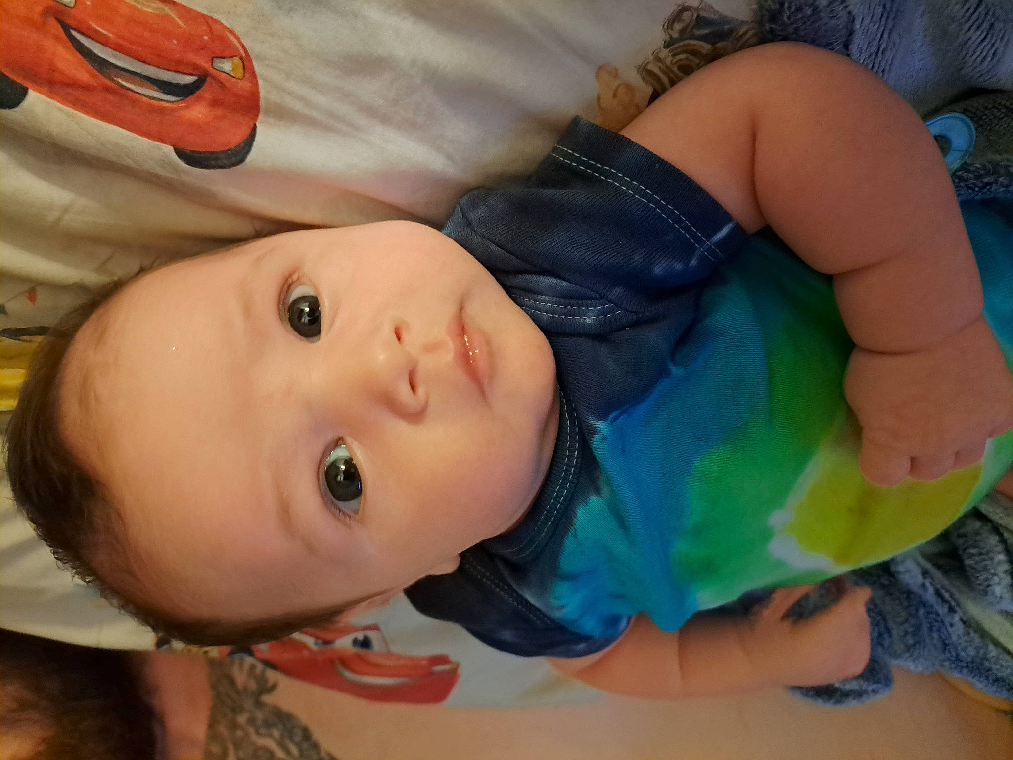 Jax is registered to the contest to win money with this photo: baby, baby_products, baby_toddler_clothing, cheek, chest, child, comfort, eye, eyebrow, eyelash, fun, happy, head, iris, mouth, nose, person, product, skin, toddler