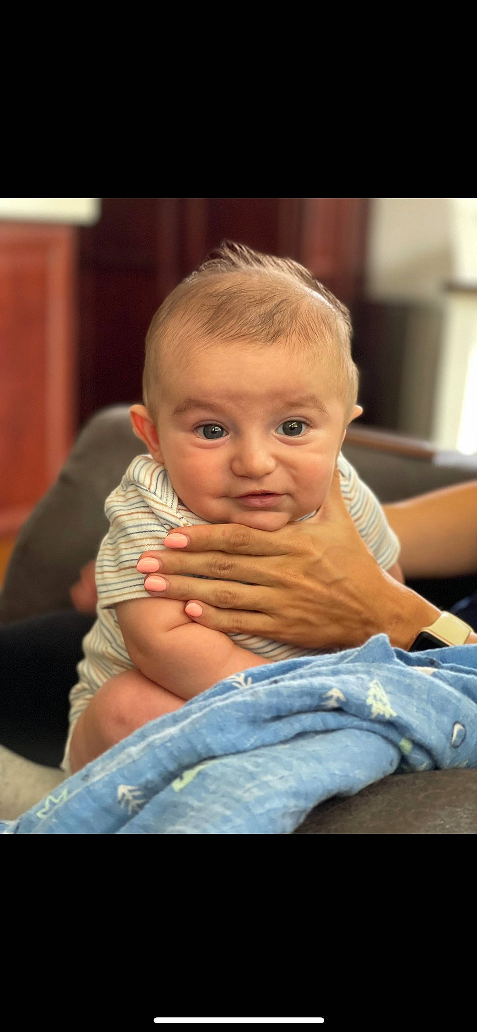 John is registered to the contest to win money with this photo: arm, baby, baby_toddler_clothing, cheek, child, chin, comfort, elbow, flash_photography, gesture, happy, leg, lip, mouth, nose, person, shoulder, skin, thumb, toddler