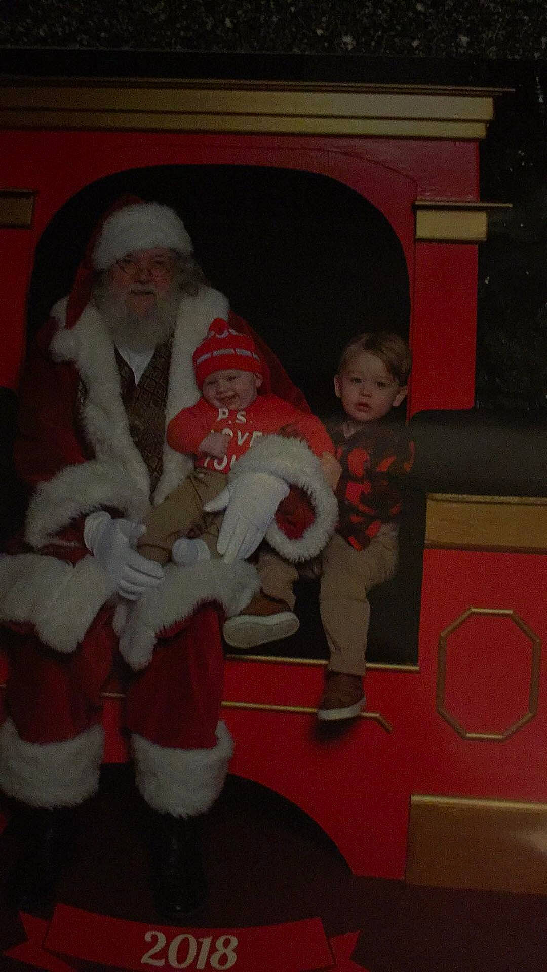 Wrigley joined the competition — help win amazing prizes! christmas, event, fictional_character, fun, headwear, holiday, lap, person, red, santa_claus