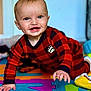 Austin joined the competition — help win amazing prizes! baby, child, crawling, smiling, red_clothing, checkered_pattern, indoor, foam_mat, colorful, playtime, happy, cute, young, person, head, hand, floor, toys, portrait, bright