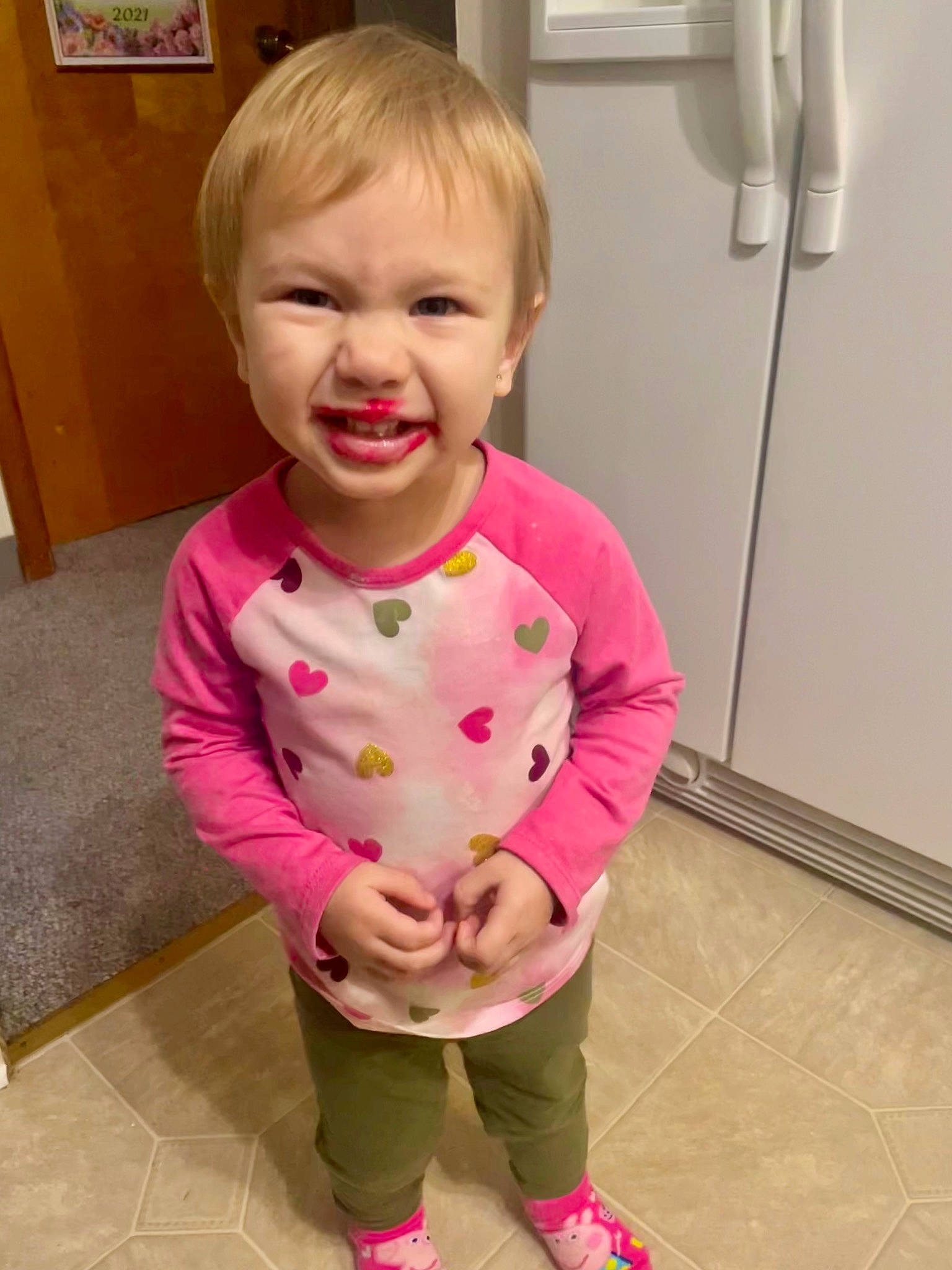 Kimberly is registered to the contest to win money with this photo: baby, baby_toddler_clothing, cheek, child, clothing, door, eyelash, floor, flooring, hair, happy, head, iris, pattern, person, pink, skin, sleeve, smile, t_shirt