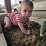 baby, child, crawling, dirt, garden, outdoor, striped_shirt, curious, face, hands, soil, tool, car, cloudy_sky, plant_bed, young_child, expression, barefoot, concrete_border, nature