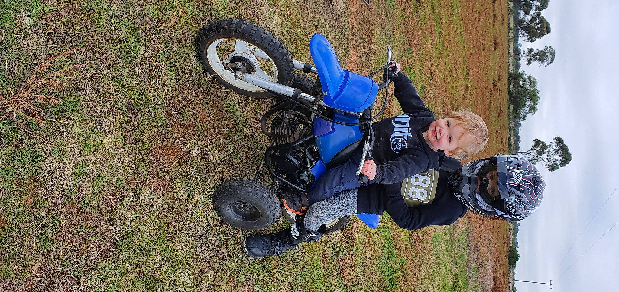 Cruz is registered to the contest to win money with this photo: automotive_tire, automotive_wheel_system, headwear, joy, off_roading, person, recreation, tire, vehicle, wheel