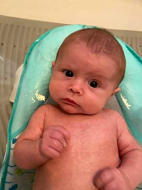 Karsyn is registered to the contest to win money with this photo: baby, baby_bathing, baby_making_funny_faces, bathing, bathtub, cheek, child, chin, eye, face, forehead, head, iris, lip, mouth, muscle, nose, person, skin, smile