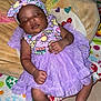D Aria joined the competition — help win amazing prizes! baby, sleeping, purple_dress, headband, plush_cushion, colorful_blanket, hand, foot, infant, indoors, soft_lighting, cute, peaceful, child, tutu, patterned_clothing, fabric, relaxing, resting, adorable