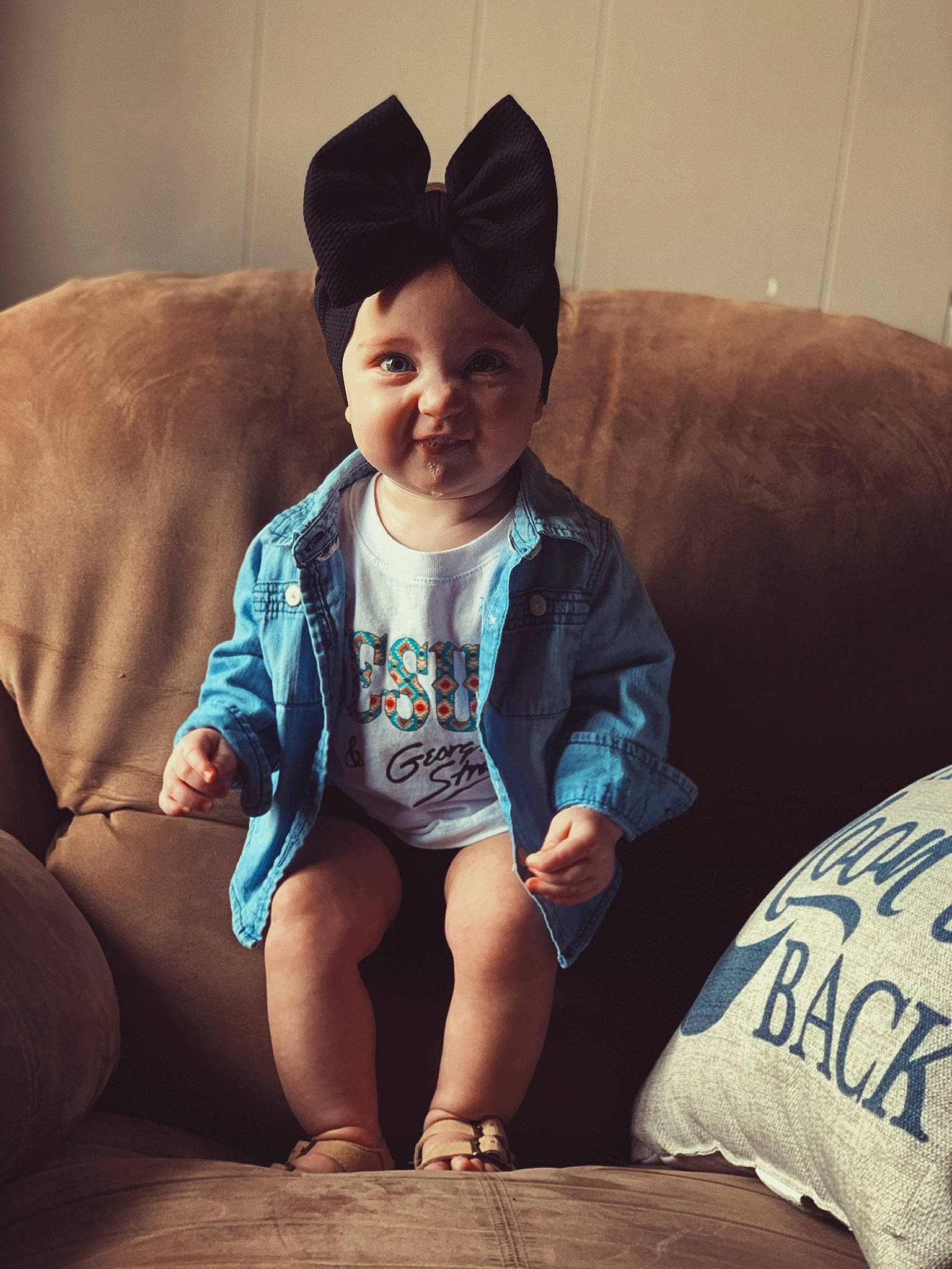 Shaelynn joined the competition — help win amazing prizes! baby_toddler_clothing, comfort, cool, couch, eye, face, facial_expression, finger, flash_photography, hairstyle, happy, human, mammal, mouth, person, skin, sleeve, smile, standing, toddler