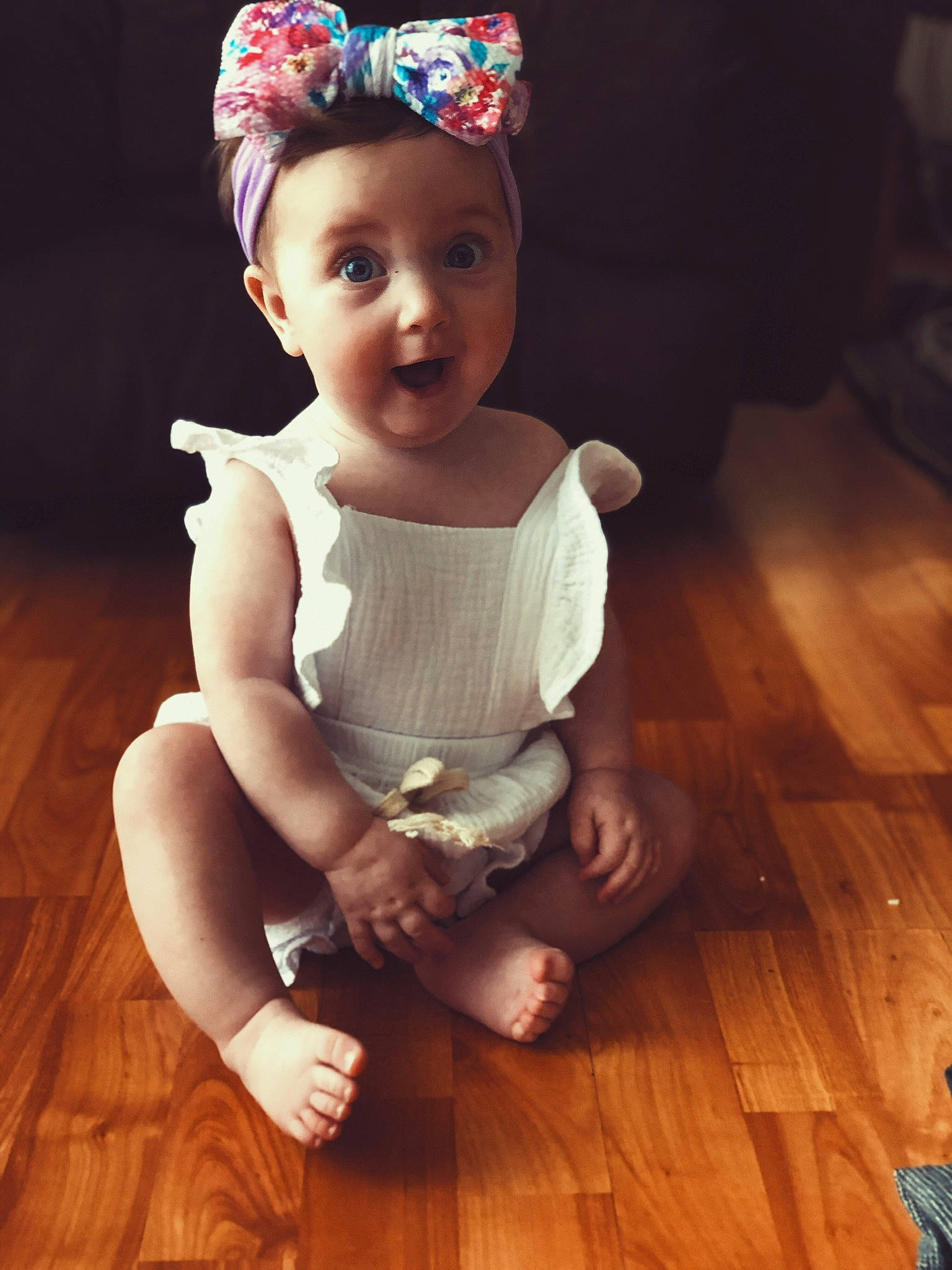 Shaelynn joined the competition — help win amazing prizes! baby, baby_toddler_clothing, cap, costume_hat, finger, flooring, hand, happy, hardwood, headband, headpiece, human_leg, iris, laminate_flooring, person, skin, sleeve, smile, surprise, t_shirt
