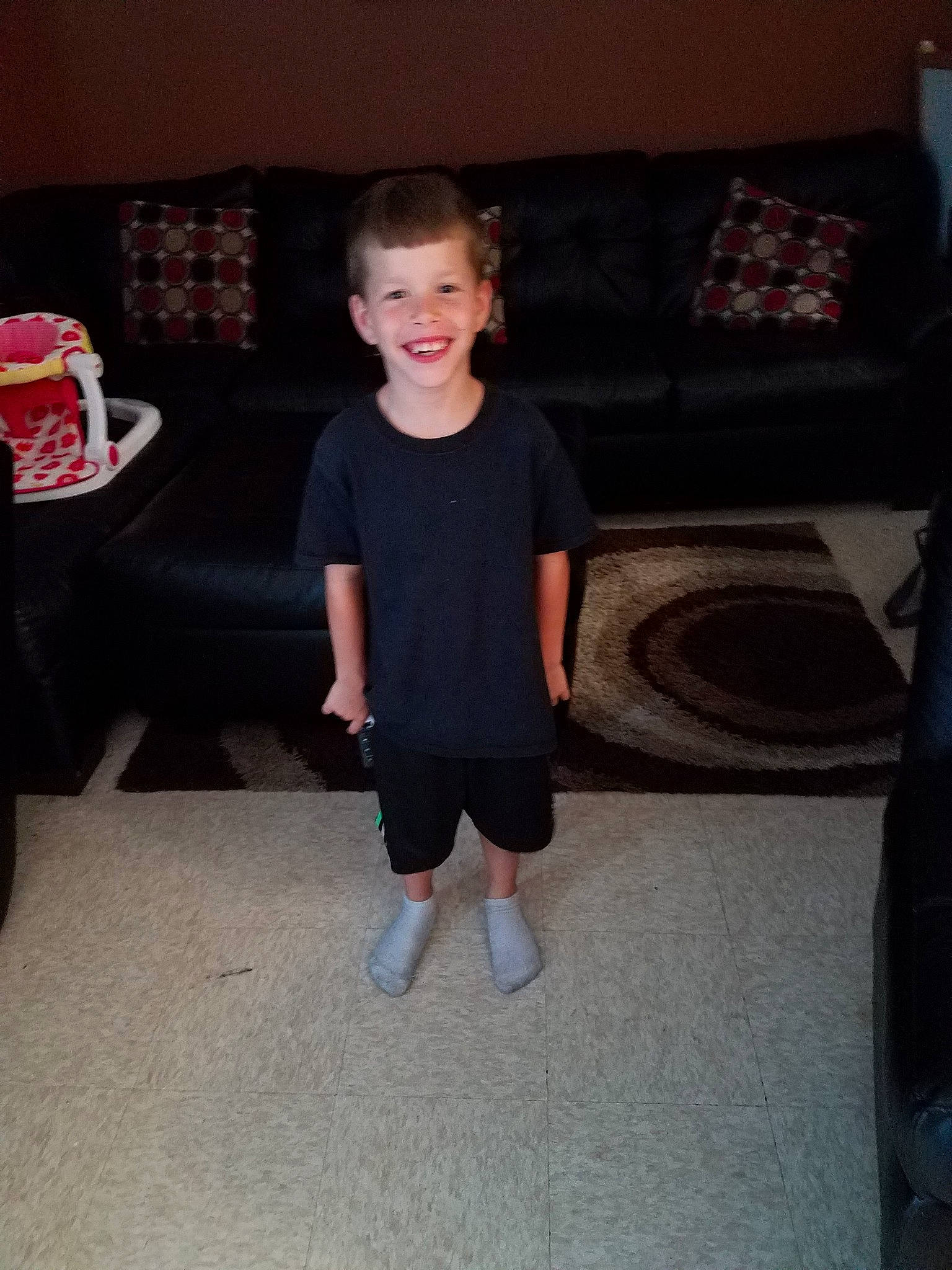 Joey joined the competition — help win amazing prizes! child, flooring, fun, joy, leg, person, shoe, sitting, smile, standing, toddler