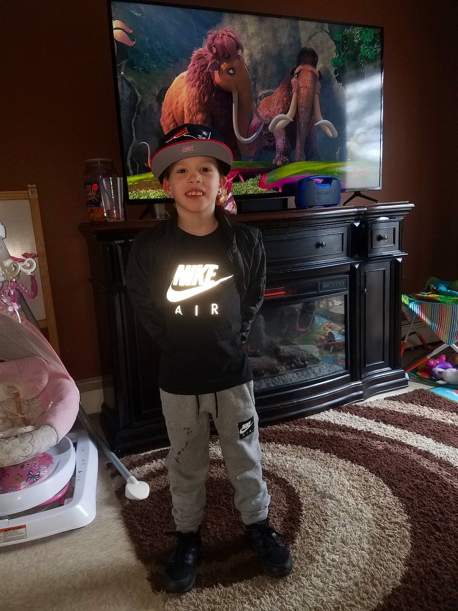 Joey is registered to the contest to win money with this photo: child, costume, flooring, headwear, joy, person, room, shoe, toddler