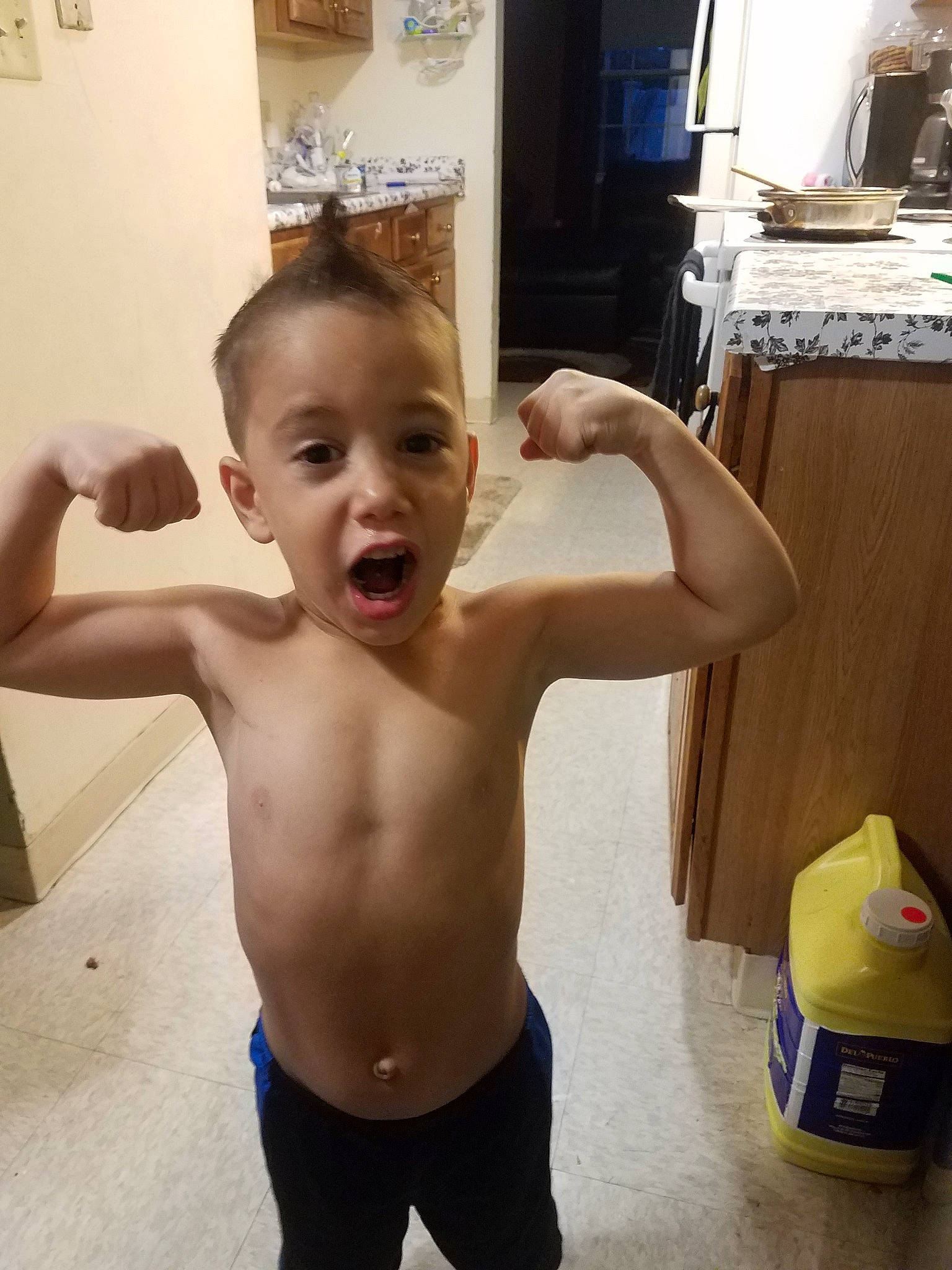 Jeffrey is registered to the contest to win money with this photo: arm, barechested, chest, child, male, muscle, person, shoulder, surprise, toddler, trunk