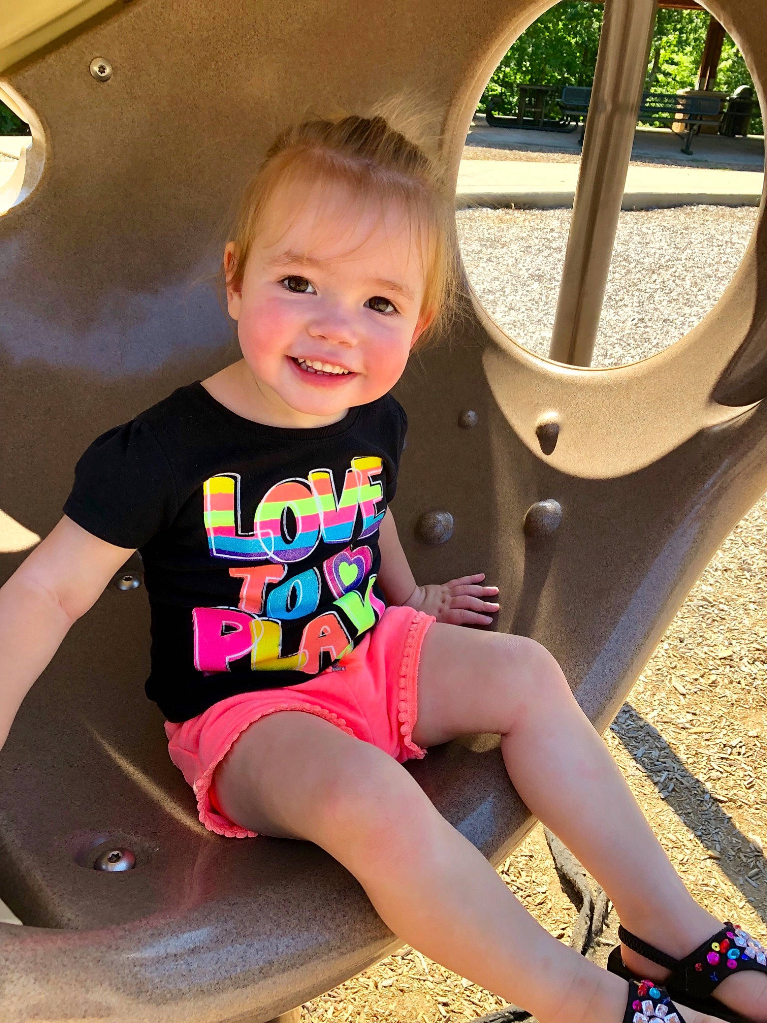 Karley joined the competition — help win amazing prizes! auto_part, child, child_model, fun, joy, leg, leisure, outdoor_play_equipment, person, pink, play, playground, public_space, recreation, shorts, sitting, skin, smile, summer, t_shirt