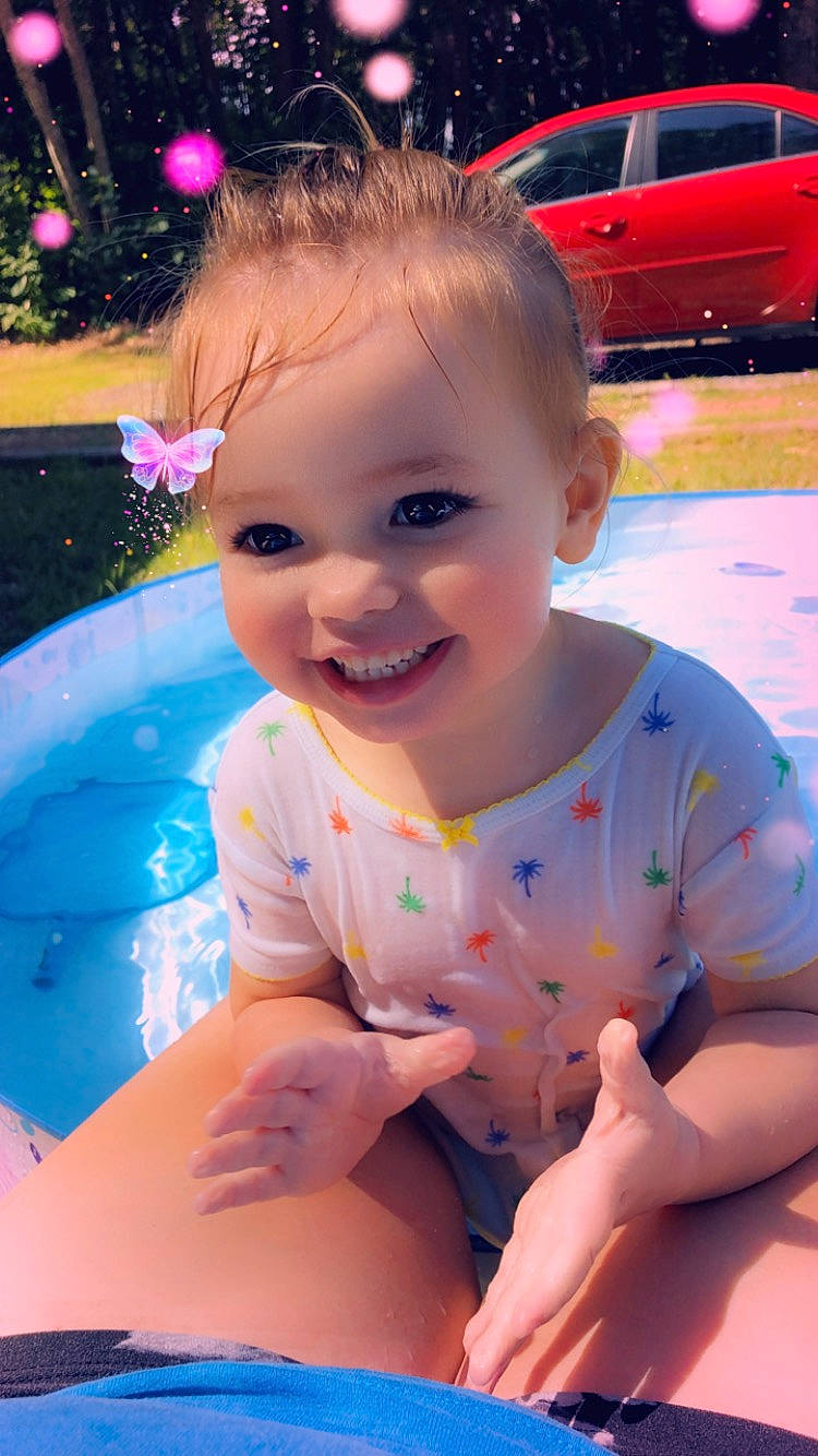 Karley joined the competition — help win amazing prizes! baby, cheek, child, face, finger, fun, games, joy, leisure, person, play, recreation, sitting, skin, smile, summer, toddler, vacation
