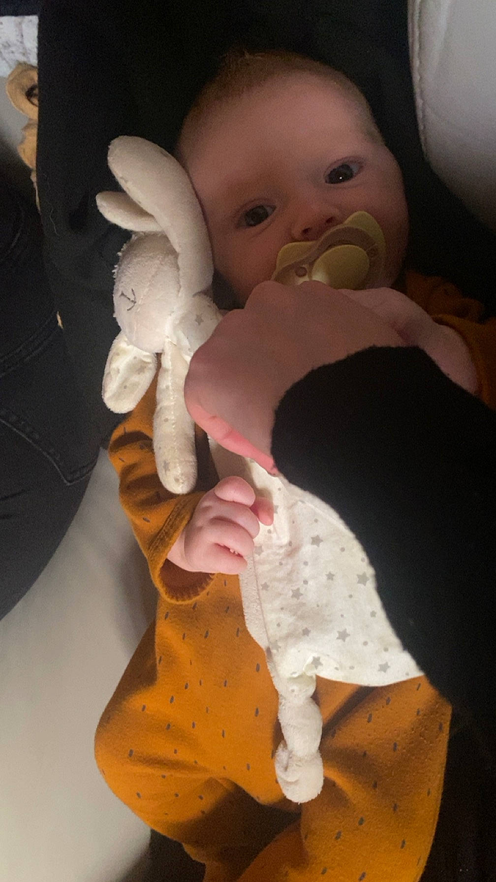 Tyago participe au concours pour gagner de l'argent avec cette photo : baby, baby_products, baby_toddler_clothing, baby_toys, cheek, child, comfort, ear, finger, gesture, happy, nail, nose, person, sitting, skin, sleeve, stuffed_toy, thumb, toddler