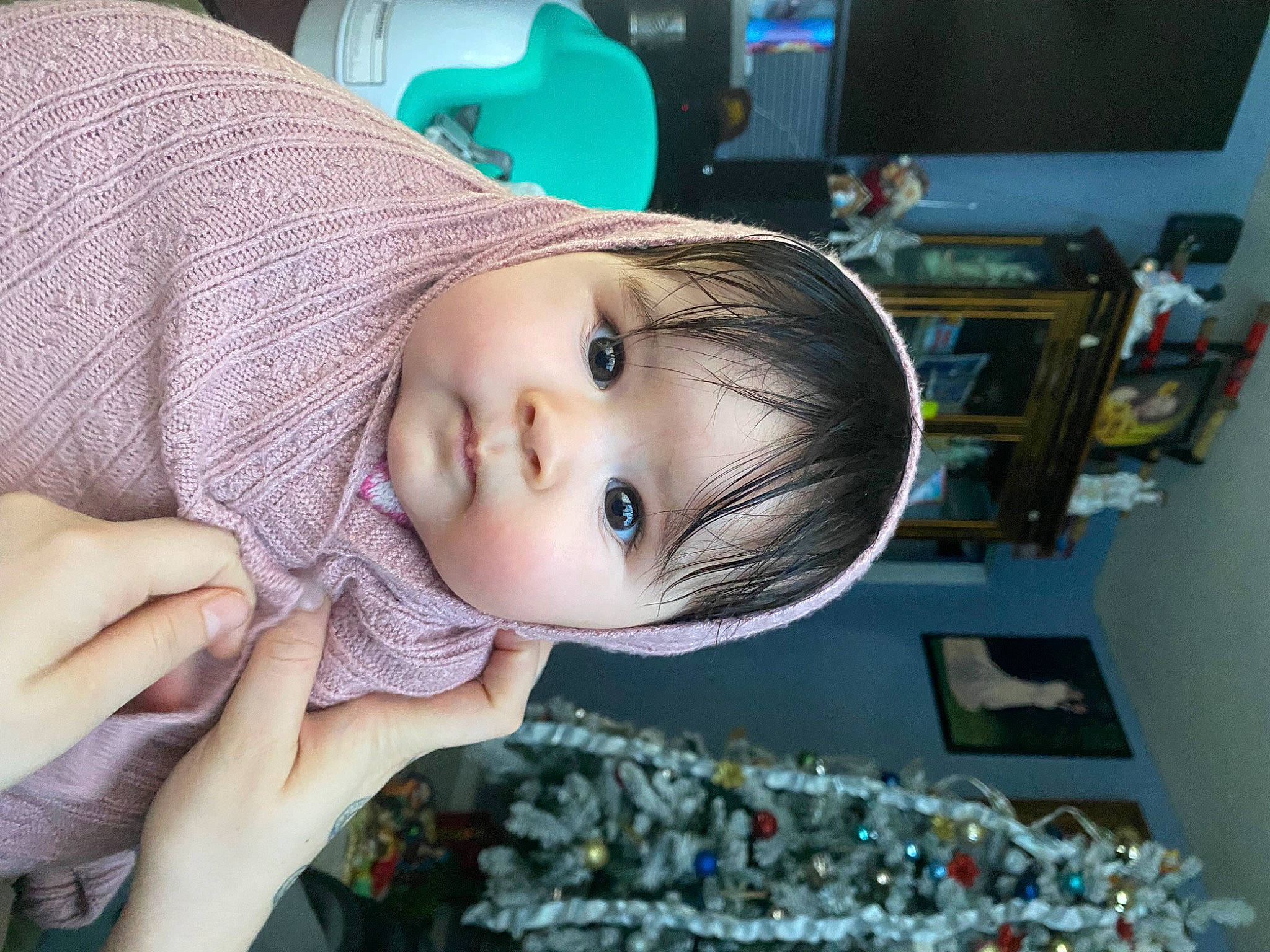 Amity is registered to the contest to win money with this photo: baby, cheek, child, eyebrow, eyelash, fashion_accessory, finger, fun, happy, hat, iris, lip, machine, nail, nose, person, room, shelf, skin, toddler