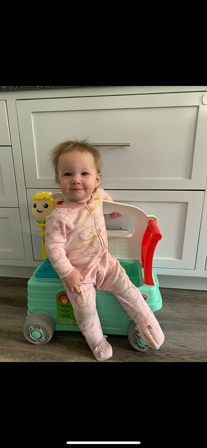 Thena joined the competition — help win amazing prizes! baby, baby_toddler_clothing, cabinetry, child, drawer, face, flooring, foot, fun, happy, head, human_leg, joy, leg, person, sitting, sleeve, smile, sock, standing