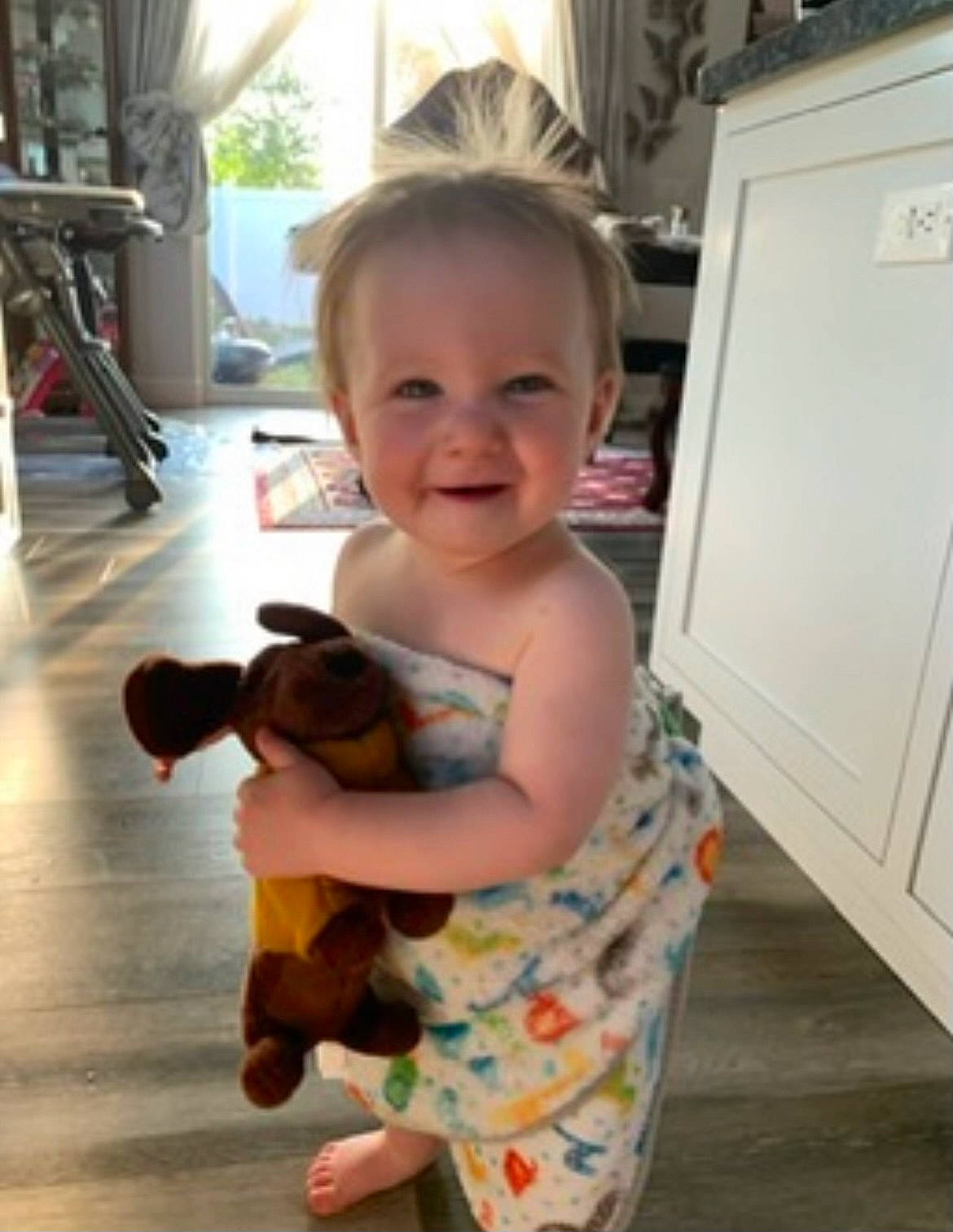 Thena joined the competition — help win amazing prizes! arm, facial_expression, fawn, finger, floor, flooring, hair, happy, human_body, iris, joint, joy, leg, mammal, person, shoulder, skin, smile, standing, toddler