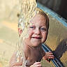 Kinsley is registered to the contest to win money with this photo: child, toddler, water, splash, blue_eyes, smile, bathtub, hand, wet_skin, outdoor, sunlight, happy, baby, face, playing, summer, cute, closeup, waterfall, fun
