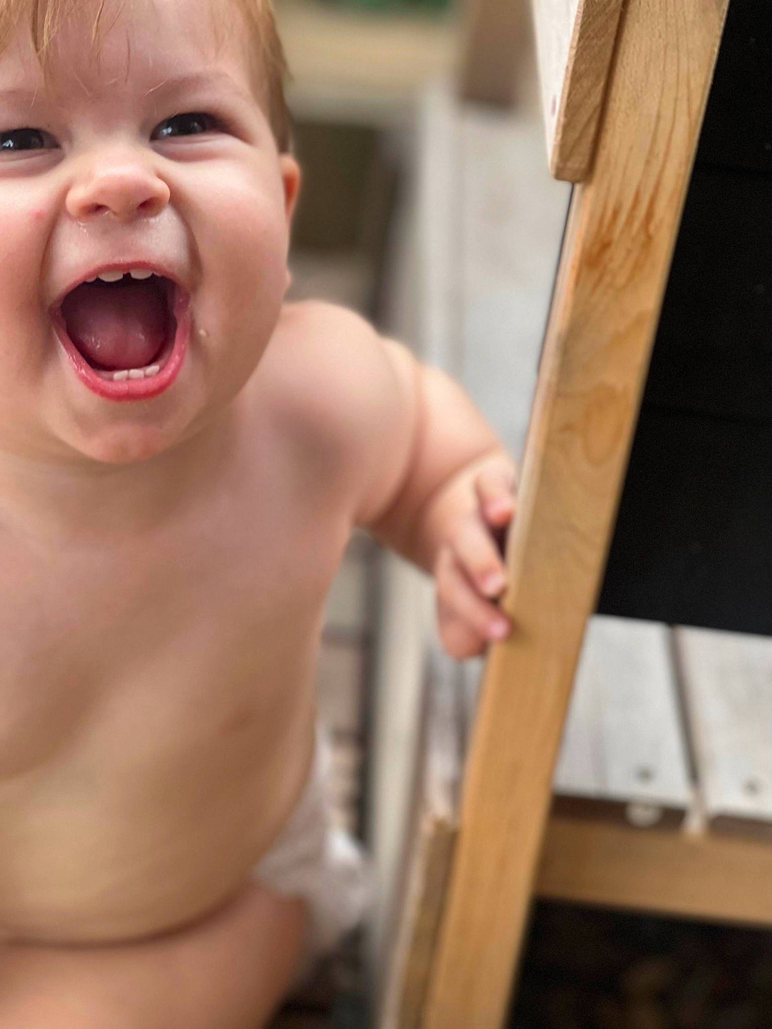 London is registered to the contest to win money with this photo: baby, cheek, chest, ear, eye, eyelash, finger, gesture, happy, human_body, iris, jaw, lip, mouth, muscle, nose, person, smile, thumb, toddler