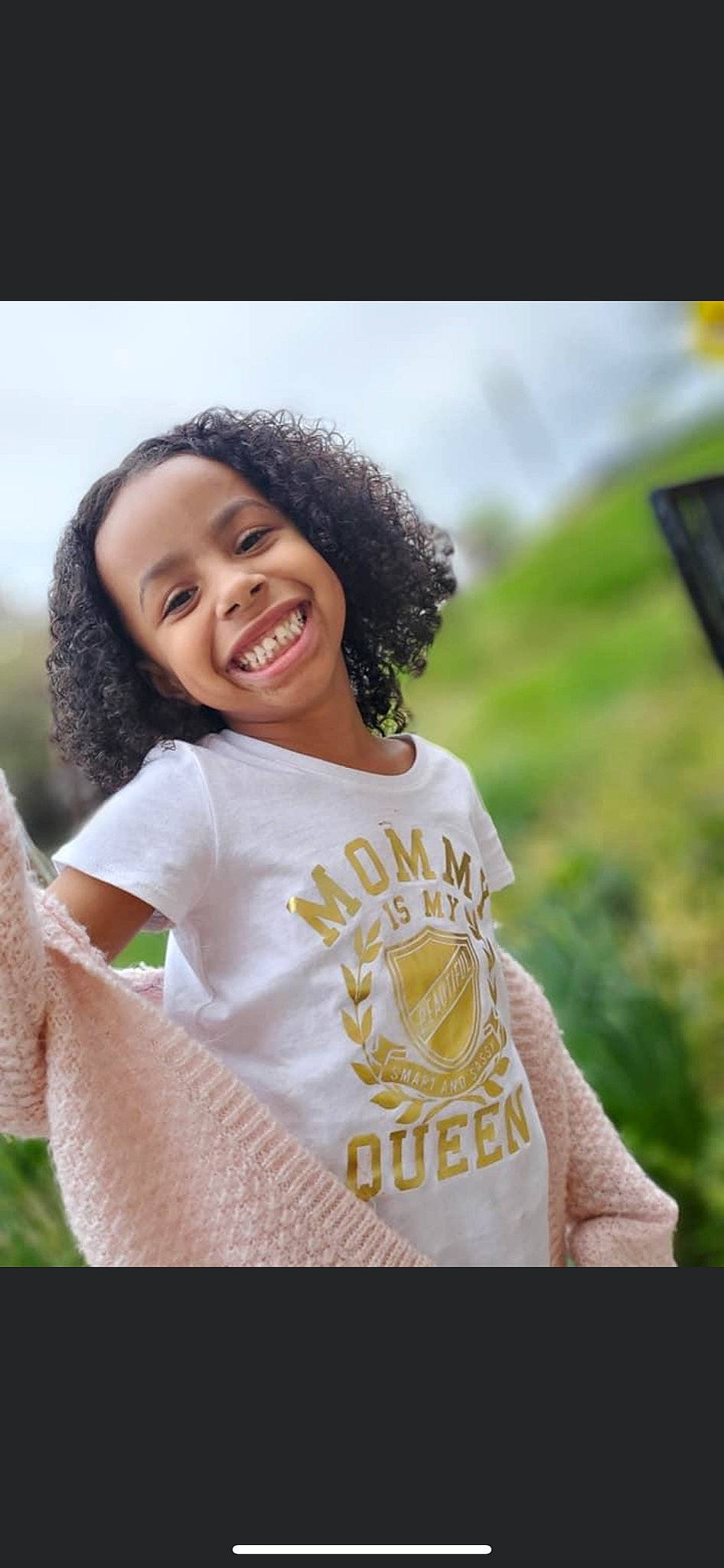 Lamiya is registered to the contest to win money with this photo: child, facial_expression, fun, grass, happy, joy, laugh, person, photography, portrait, portrait_photography, skin, smile, t_shirt