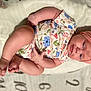 Makenzly Grace joined the competition — help win amazing prizes! adorable, baby, blanket, bow, child, cute, floral_pattern, happy, headband, infant, lying_down, newborn, onesie, peaceful, pink, portrait, skin, small, smile, soft