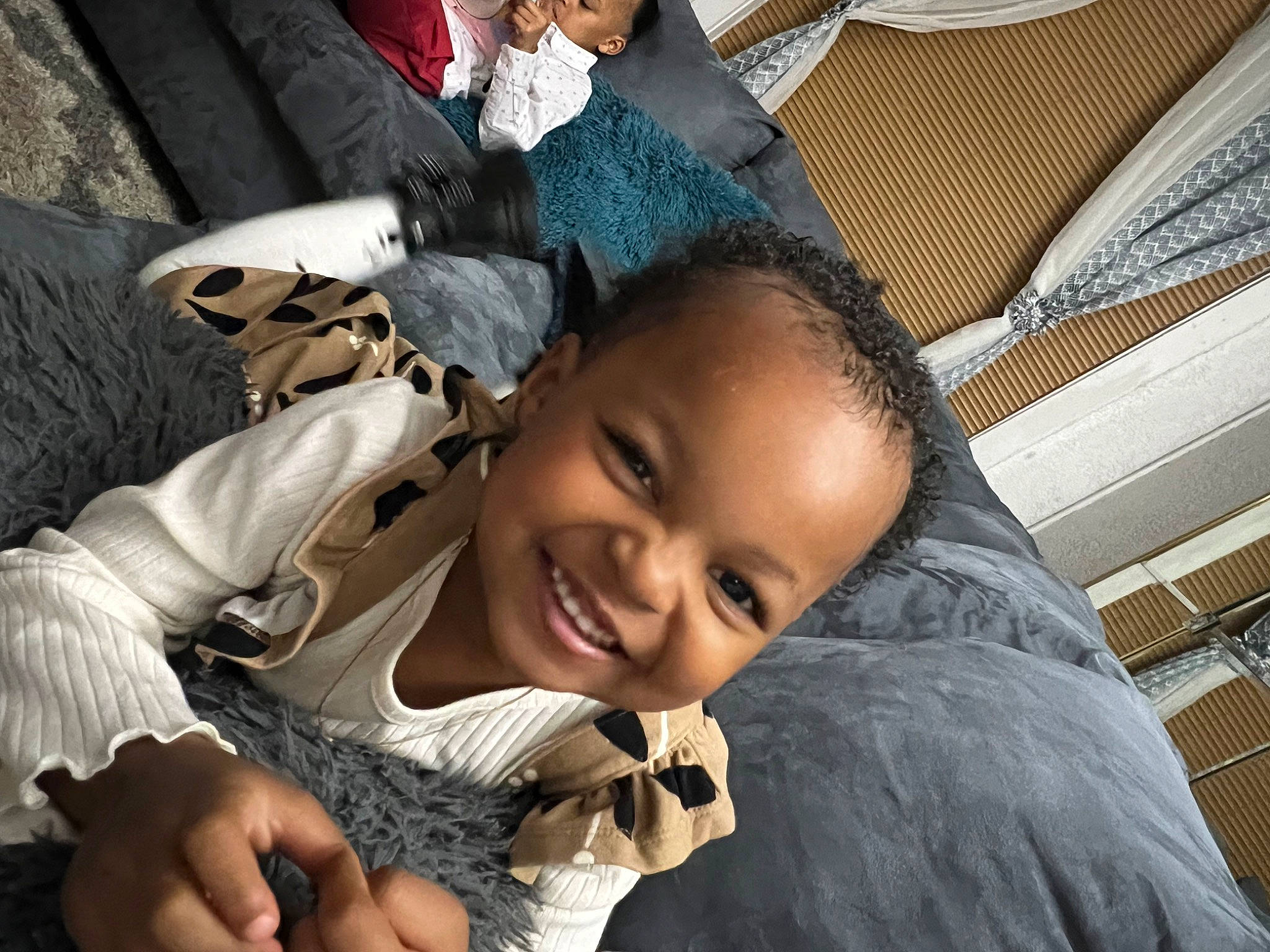 Malaya joined the competition — help win amazing prizes! black_hair, child, fashion_accessory, flash_photography, fun, gesture, happy, joy, laugh, leisure, mouth, person, portrait_photography, sitting, smile, toddler, tourism, tradition, travel