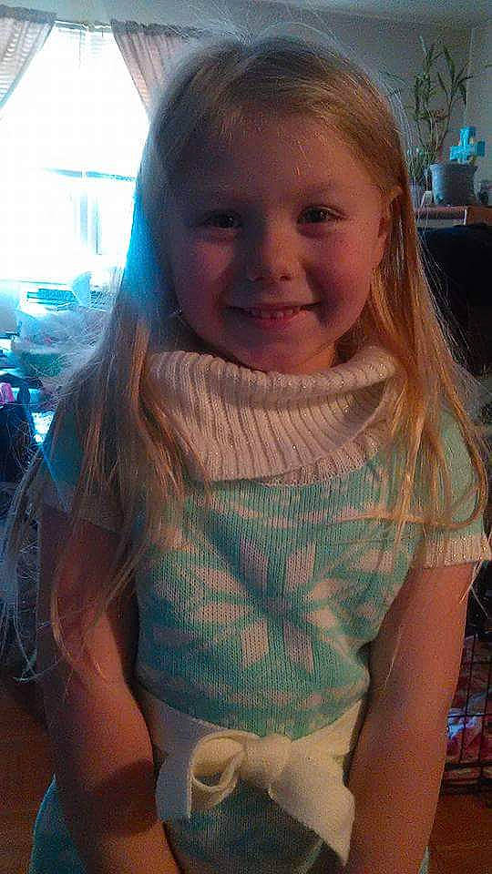 Angel Rose is registered to the contest to win money with this photo: blond, brown_hair, child, face, hair, hair_coloring, hairstyle, joy, knitting, long_hair, neck, person, smile