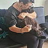 Oscar Marcus participe au concours pour gagner de l'argent avec cette photo : affection, black_cat, black_clothing, cat, comfort, couch, furniture, glasses, grooming, hair_brush, home, indoor, love, person, pet, relaxed, short_hair, sitting, tattoos, wooden_floor